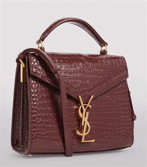 ysl gold mini bag|ysl mini cassandra bag.